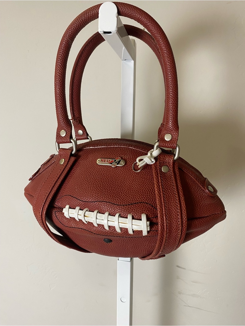 Red 24 leather Football-Style Top-Handle Bag in Brown-Red